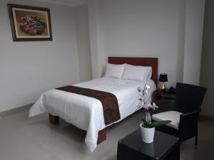 Cama o camas de una habitación en Gran Caral Hotel