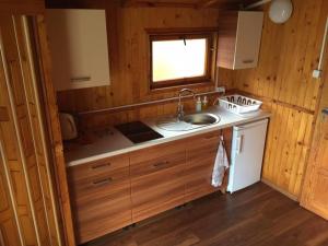 Η κουζίνα ή μικρή κουζίνα στο POLA Ustronie Morskie +18 φωτογραφίες