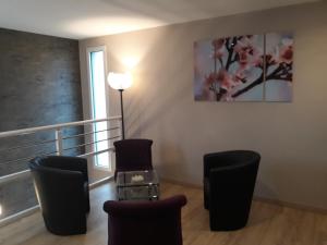 Posezení v ubytování Chambre d'hôtes Les Bruyères