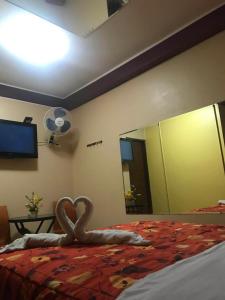 Postel nebo postele na pokoji v ubytování Hotel Manantial No,002