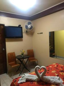 Postel nebo postele na pokoji v ubytování Hotel Manantial No,002