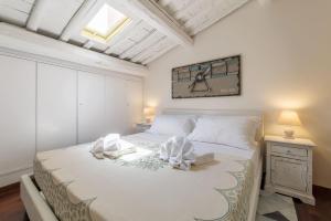 Katil atau katil-katil dalam bilik di CS Spanish Steps Luxury Apartment