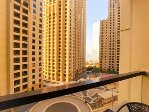 a view of a city from a balcony in a building at JBR, Bahar 1 in Dubai
