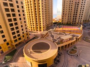 an aerial view of a city with tall buildings at JBR, Bahar 1 in Dubai