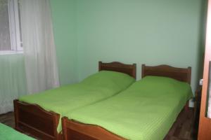 Voodi või voodid majutusasutuse Borjomi Makvala's Guest House toas