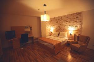 Ein Bett oder Betten in einem Zimmer der Unterkunft Hotel Pinocchio