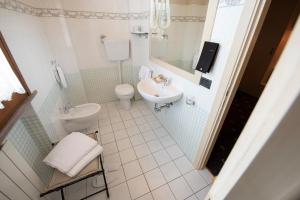 Koupelna v ubytování Holiday Rooms Antica Badia
