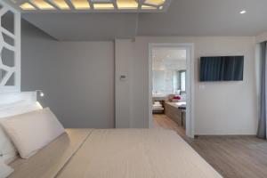 A bed or beds in a room at KB Ammos