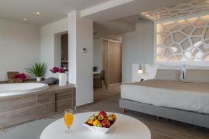 A bed or beds in a room at KB Ammos