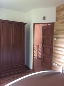 Letto o letti in una camera di Apartament na Wzgórzu