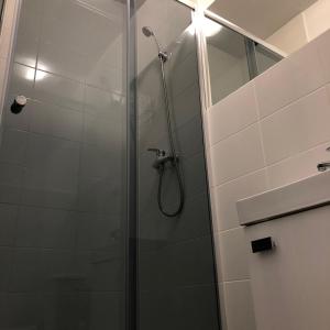 Phòng tắm tại Kwadrat Apartamenty Grottgera