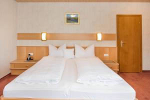 Postel nebo postele na pokoji v ubytování Hotel Garni Waldhof - Wohlfühlen am Lech