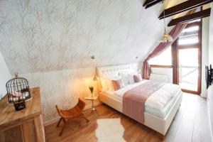 Posteľ alebo postele v izbe v ubytovaní Horvát Family Residence