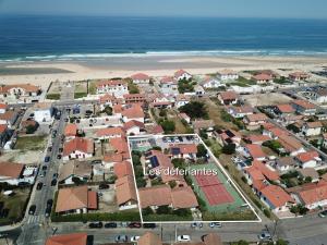 an aerial view of a town with a beach at Appartements Les Déferlantes Mimizan-plage in Mimizan