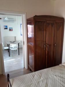 Postel nebo postele na pokoji v ubytování Atrium - Lafkos