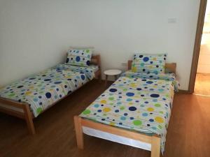 Voodi või voodid majutusasutuse Apartmani Gmitrovic toas