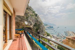 a balcony with a view of the amalfi coast at Belvedere Apartment in Amalfi