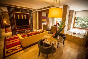 Cama ou camas em um quarto em Sumaq Machu Picchu Hotel