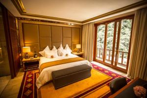 Cama ou camas em um quarto em Sumaq Machu Picchu Hotel