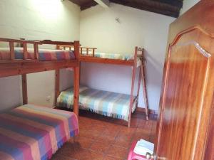 Voodi või voodid majutusasutuse Estancia, CABAÑAS INTAG toas
