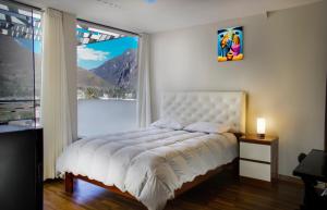 Postel nebo postele na pokoji v ubytování Hotel California Calca