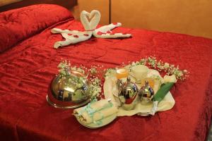 Abalon Pompei Resort客房内的一张或多张床位