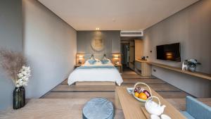 Ένα ή περισσότερα κρεβάτια σε δωμάτιο στο Shanghai Pagoda INNO Hotel +48 φωτογραφίες