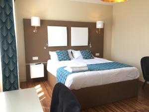 Postel nebo postele na pokoji v ubytování chambre suite B&B