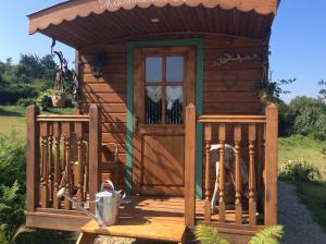 Zahrada ubytování Roulotte de luxe vue mer 180° ,et un ha de verdure