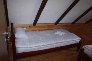 Voodi või voodid majutusasutuse Apartmani Prisoje toas