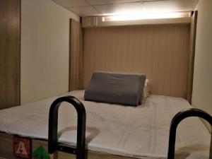 Postel nebo postele na pokoji v ubytování Hostel Jiizu
