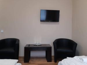 Telewizja i/lub zestaw kina domowego w obiekcie Pazonyi Fogadó és Étterem