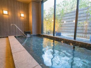 Bazén v ubytování TABINO HOTEL Sado nebo v jeho okolí