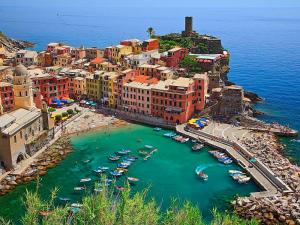 an aerial view of a harbor with boats in the water at A cà di Bafirussi in Vernazza