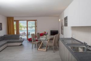 Posedenie v ubytovaní Exclusive Suites Riva