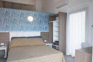 Letto o letti in una camera di Exclusive Suites Riva