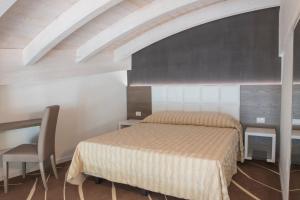 Posteľ alebo postele v izbe v ubytovaní Exclusive Suites Riva