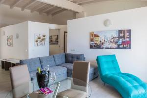 Posedenie v ubytovaní Exclusive Suites Riva