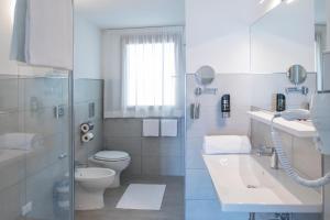 Kúpeľňa v ubytovaní Exclusive Suites Riva + 37 fotografií
