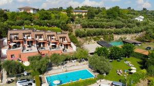 an aerial view of a resort with a swimming pool at Holidays Residence in Lazise