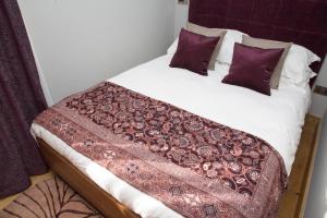 Ein Bett oder Betten in einem Zimmer der Unterkunft The Hugo - Hotel Concept Canterbury