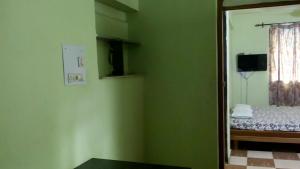TV a/nebo společenská místnost v ubytování Aguiar guest House