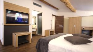 Postel nebo postele na pokoji v ubytování Hotel Corona