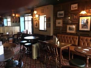 Area soggiorno di Greyfriars Inn by Greene King Inns