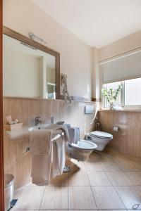 Koupelna v ubytování Verdeluna ApartHotel