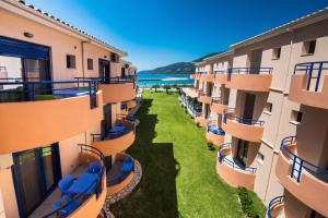 an aerial view of a row of apartment buildings at Akroyiali Resort in Vasiliki