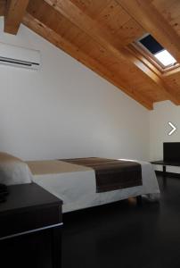 Postel nebo postele na pokoji v ubytování Hotel Villa Altura