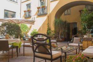 Posezení v ubytování Le Cheminée Business Hotel Napoli