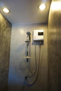 Vonios kambarys apgyvendinimo įstaigoje Replay Condo Studio Room