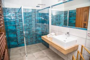 Koupelna v ubytování Spa & Wellness Hotel St. Moritz